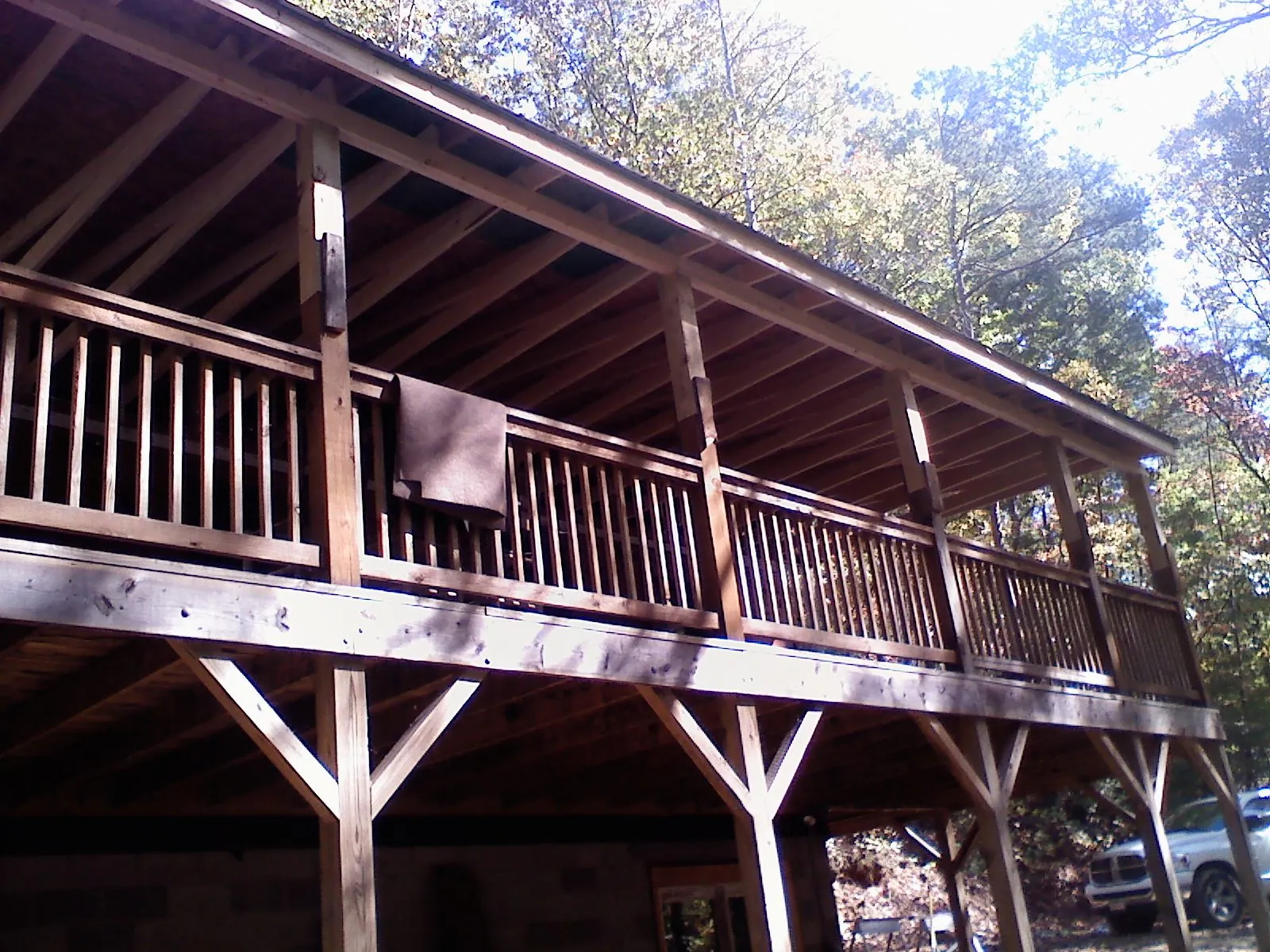 Timber framing under a new elevated porch and deck — Roof Leak Repair in Shawnee by Roofing Brothers